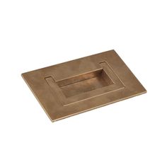 a square metal object on a white background