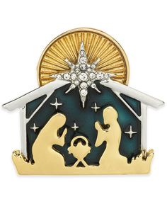 a christmas nativity pin with the birth of jesus