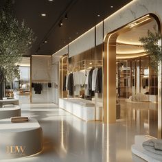 the inside of a luxury store with clothes on racks