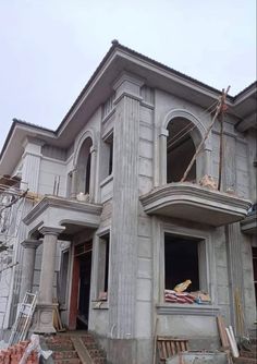 an unfinished house is shown in the middle of construction