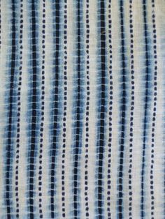 an image of a blue and white striped fabric on the app store's iphone