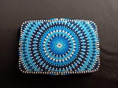 Beautiful Blue sunburst it is 3" × 4.5" and is backed with buckskin Beaded Belt Buckle, Native American Beadwork Patterns, Native Beading, Native American Beadwork, Beadwork Patterns, Beading Ideas, Beaded Belt, Native American Beading, Suspender Belt