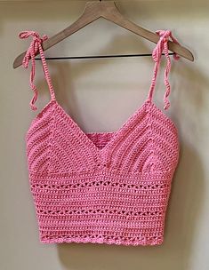 handmade crochet halter top made by me Sz S/M. Bright pink  Measurements  Width of chest 16 1/2in Width of waist 16 1/2in Length of top from under the chest 7in Straps are adjustable (ties at shoulder) Cup size 34 - 36in  Width 8in Length 7in Unlined  Crochet top is made from 100% mercenized cotton yarn. There is some stretch to the garment.  Hand wash, lay flat to dry Any questions or requests for additional photos, send me a message.  Pattern inspiration  Etsy shop BeachWearRoom Crochet Cami Top, Pink Crochet Top, Crochet Halter Top, Womens Halter Tops, Crochet Summer Tops, Pattern Inspiration, Pink Crochet, Crochet Halter, Crochet Halter Tops