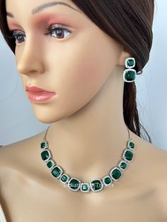 Emerald CZ diamond Necklace, Indian Pakistani wedding Jewelry, Mother of the Bride, Crystal Necklace, Bridesmaid, Gift for her  Gorgeous Emerald CZ Set in aaa quality CZ stones. This American Diamond Necklace Set comes with a pair of earrings. Necklace length 16 inches and shortened to 15 inches  Earrings Length approx 1 inch Regular size and adjustable Arrives in a gift box. Highest quality and craftsmanship Ready to ship from California, United States and delivery in 3-5 days in US Please let Green Sparkling Stones Jewelry Sets For Wedding, Silver Emerald Jewelry Sets For Wedding, Elegant Green Rhinestone Necklace For Wedding, Green Crystal Rhinestone Necklace For Formal Occasions, Green Crystal Rhinestone Necklace For Wedding, Elegant Emerald Bridal Necklace For Wedding, Dazzling Emerald Jewelry For Wedding, Diamond White Emerald Wedding Jewelry, Dazzling Emerald Bridal Necklace For Wedding