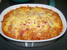 a casserole dish filled with pasta and cheese