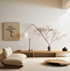 a living room with white walls and furniture