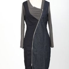 a black and grey dress with zippers on the side