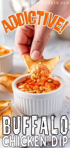 someone dipping some food into a bowl with tortilla chips in it and the caption reads addictive buffalo chicken dip