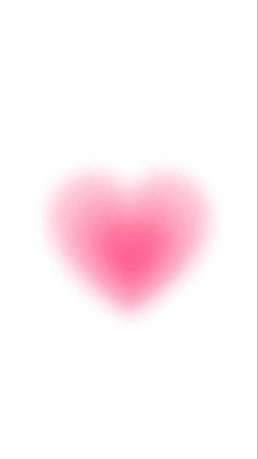 a pink heart is shown in the middle of a white screen with red text on it