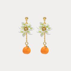 Orange Flower Stud Earrings are a fancy earring design among nature jewelry. They have enamel paint flowers and orange pendants, connected by 18k gold chain. These fruit and flower earrings come from Selenichast jewelry store. Citrus Jewelry, Gift Wishlist, Paint Flowers, Cat Pendant Necklace, Mermaid Pendant, Fruit Jewelry, Simple Gift Wrapping, 18k Gold Chain, Sweet Citrus