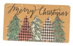 a merry christmas door mat with trees on it