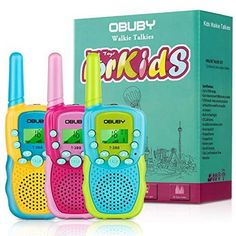 three children's walkie talkies sitting next to each other in front of a box