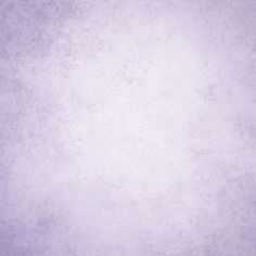 a purple background with some white spots on it