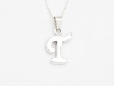 Letter T Pendant made of Solid 925 Sterling Silver ☞ made to last. Full Letters Collection (Silver)Full Letters Collection (Gold)Full Letters Collection (White Gold)Full Letters Collection (Rose Gold) Details:• Letter T Pendant• Dimensions: Pendant Height 25mm, Width 14mm• Free Complimentary Chain• Solid 925 Sterling Silver SKU TE-104 Tan Sterling Silver Initial Pendant Necklace, Sterling Silver Initials Necklace In Tan, Tan Sterling Silver Initials Necklace, Sterling Silver Tan Necklaces With Initials, Classic Sterling Silver Necklace In Tan, Classic Tan Sterling Silver Necklace, Tan Sterling Silver Jewelry Gift, Tan Sterling Silver Jewelry As A Gift, Tan Sterling Silver Jewelry For Gift