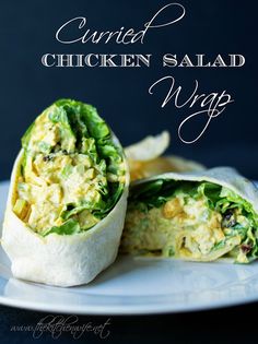 an egg salad wrapped in bread on a plate with the words, currie chicken salad wrap