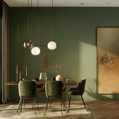 a dining room with green walls and chairs