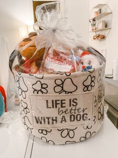 a dog themed gift basket is on the counter