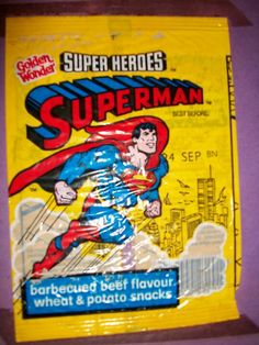 an old comic book with superman on the cover