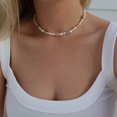 This Bonbon pearl necklace is the perfect accessory for a sunny day. Its colorful array of pastel gemstones & lustrous pearls will bring a sweet and airy style to any ensemble. 14.75” in length Freshwater pearls, morganite, rose quartz, blue lace agate, amethyst and gold filled components. All stones and pearls are natural in shape and will vary on each necklace. Pastel Necklace, Colored Necklace, Necklace Stone, Summer Necklace, Necklace Fashion, Necklace Gemstone, Blue Lace Agate, Colourful Necklace, Girly Fashion