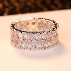 a diamond ring is shown on a table