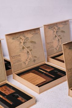 six wooden boxes with different types of items in them