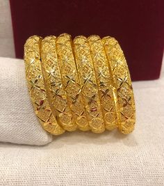 Christmas Gift, Holiday Gift,  24k gold plated Bangles, Indian Bridal Bangles, Handmade Bracelet for Women Gold Bangles for Women - Indian Bridal Bangles - Handmade Bracelet These stylish bangles feature a classic bangle design and are available in gold color. ▶ BEAUTIFUL HINGED GOLD BRACELET ▶ HIGED TO OPEN WIDE----- STAYS SECURELY SHUT -----  LIFT TAB SIDE TO OPEN Material: High quality 24k gold plated bangles ( Not solid gold) Diameter: 2.36 inches Can open Lead & Nickel free Tarnish resistan Gold Bracelet Jewelry For Festivals, Gold Festival Bracelet Jewelry, Yellow Gold Plated Bangle For Gift, Yellow Gold Plated Bangle As A Gift, Yellow Gold-plated Bangle For Gift, Yellow Gold-plated Bangle As Gift, Yellow Gold-plated Bangle Jewelry, Gold Christmas Festive Bracelets, Gold Bracelet With Intricate Design As Festival Gift