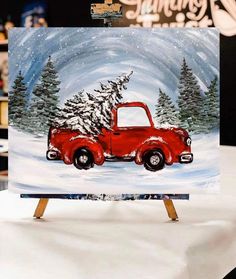 a painting of a red truck carrying a christmas tree