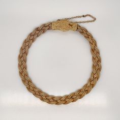 A very fine 14k gold Etruscan style bracelet.  With three delicate strands of woven braided gold wire terminating in an Etruscan style box clasp with granulated and wire work decoration.   Set with a safety chain.  Simply a finely-made Etruscan style bracelet!  Date: 20th Century  Overall Condition: It is in overall good, as-pictured, used estate condition with some very fine & light surface scratches and other signs of expected light wear consistent with age.  Fineness: Marked 14k for gold fine Elegant Braided Bracelet Jewelry, Elegant Gold Braided Jewelry, Style Box, Box Clasp, Safety Chain, Wire Work, Gold Wire, Fashion Bracelets, Vintage Antiques