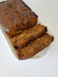 two slices of banana bread on a white plate