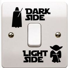 a light switch cover with the words dark side and yoda stickers on it