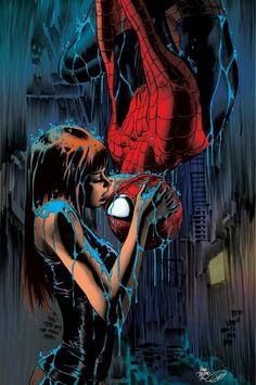 spider - man and woman in the rain with their hands on each other's face