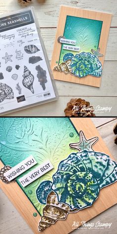 some cards with different designs on them sitting on a wooden table next to pine cones