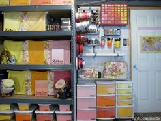 shelving unit with lots of craft supplies on it's shelves in a store