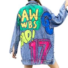 Make a bold statement with our Painted Graffiti Print Denim Jacket from the 2023 Autumn-Winter Collection! This Y2K-inspired piece is designed to be lengthy and oversized. with a unique graffiti print and buttoned closure. making it the perfect addition to any wardrobe.Distinctive Features: Y2K Style: This jacket is designed with a Y2K-inspired style. featuring an oversized fit and a unique graffiti print. Painted Graffiti Print: The jacket features a one-of-a-kind painted graffiti print. a mode Trendy Oversized Denim Jacket For Streetwear, Trendy Relaxed Fit Denim Jacket For Streetwear, Trendy Oversized Multicolor Outerwear, Oversized Trendy Outerwear With Graphic Print, Trendy Oversized Outerwear With Graphic Print, Trendy Denim Jacket With Graphic Print For Fall, Blue Long Sleeve Outerwear With Graffiti Print, Trendy Cotton Outerwear With Graphic Print, Oversized Blue Denim Jacket For Streetwear