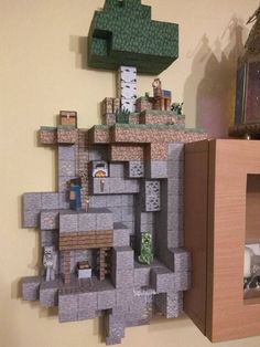 a paper model of a castle on the wall