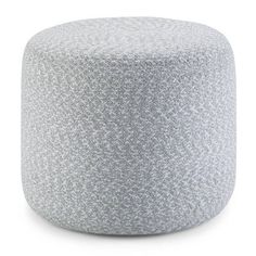 a white and grey poufle on a white background with no people around it