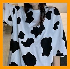 This unique and eye-catching cow print t-shirt is perfect for anyone who loves animals, especially cows! The design features a hand-painted cow print that is sure to make a statement. Made from soft and comfortable material, this t-shirt is perfect for everyday wear. Whether you're running errands or out for a casual day with friends, you'll love showing off your love for cows in style. This cow print t-shirt is perfect for animal lovers, cow enthusiasts, and anyone looking for a unique and fun t-shirt to add to their wardrobe. Casual Cow Print T-shirt For Summer, Spring Cow Print Short Sleeve Top, White Casual T-shirt With Cow Print, White Cow Print Crew Neck T-shirt, Spring Cotton Cow Print Top, Spring Cow Print Cotton Top, Short Sleeve Cotton Tops With Cow Print, Casual Short Sleeve Cow Print Tops, Casual Cotton T-shirt With Cow Print