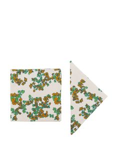 an orange and green floral print pocket square on a white background next to a folded handkerchief