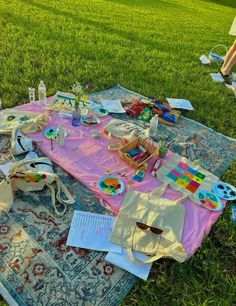 a table with many items on it in the grass