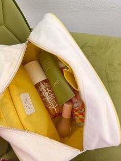 Refresh your travel bag lineup with our new favorite Daily Routine XL makeup bag! Daily Routine sewn on in our Spring color crushes Canvas exterior, lined with a stunning yellow nylon interior Dimensions: 11 x 5 x 8 inches Ships immediately! University Accessories, Jumpsuit And Blazer, Interior Dimensions, Spring Color, Blowout Sale, Color Crush, Graphic Tops, Makeup Bags Travel, Travel Makeup