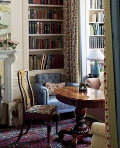 an instagram photo of a living room with bookshelves