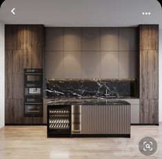 an empty kitchen with marble counter tops and wooden cabinetry, along with stainless steel appliances