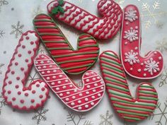 decorated cookies in the shape of letters and numbers