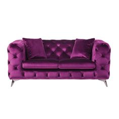 a purple couch with two pillows on it