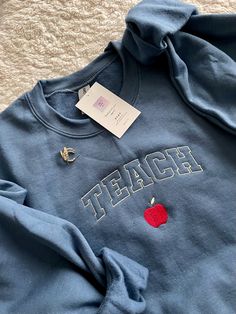 You found the perfect teacher sweatshirt! This will keep you comfortable in that cold school this year! Available sizes up to 4XL and multiple colors! Crikit Ideas, Teacher Appropriate Outfits, Teach Sweatshirt, Teacher Fits, Cute Teacher Outfits, Teacher Accessories, Teacher Vibes, Teacher Aesthetic, Teaching Outfits