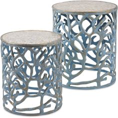 two round metal tables with marble top, one in blue and the other in white