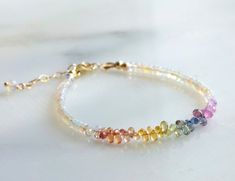 This Beaded Bracelets item by LZArtJewelry has 25 favorites from Etsy shoppers. Ships from Brentwood, TN. Listed on May 24, 2024 Rainbow Sapphires, Gold Armband, Bracelet Gemstone, Chain Extenders, Teardrop Beads, Beading Wire, September Birthstone, Jewelry Inspo, Bracelet Stack