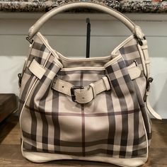 Burberry Smoked Check Belted Large Walden Hobo Bag In Preloved Condition With Signs Of Wear And Use Please Look At All Photos, All Signs Of Wear And Markings Have Been Pictured Interior Has Signs Of Use Width 14.0" Height 14.5 Depth 5.5" Type Of Material: Leather, Coated Canvas Color: Smoke Hardware: Gunmetal Closure: Open-Top Includes: Dust Bag Open Top, Burberry Bag, Hobo Bag, Burberry, Dust Bag, Bag Lady, Signs, Canvas, Leather