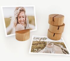 three wooden photo frames with two pictures on them and one is holding a woman's head