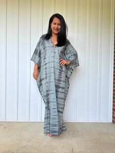 Unwind in absolute comfort with our semi sheer cotton gauze kaftan. This kaftan is perfect for the beach, pool, resort and laid-back time at home. Crafted from quality soft and breathable gauze cotton, it offers an airy fit that's ideal for lounging and cover up. Its relaxed design and easy slip-on style make it your go-to choice for outdoor cover up and relaxed nights at home. Beachy Flowy V-neck Kaftan, Casual Summer Kaftan Unlined, Summer Vacation Maxi Dress With Natural Dye, Casual Summer Unlined Kaftan, Casual Unlined Summer Kaftan, Summer Tunic With Relaxed Fit And Split Neck, Casual Flowy Festival Kaftan, Summer Split Neck Tunic With Relaxed Fit, Summer Relaxed Fit Split Neck Tunic